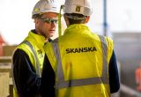 Two construction workers in Skanska branded PPE